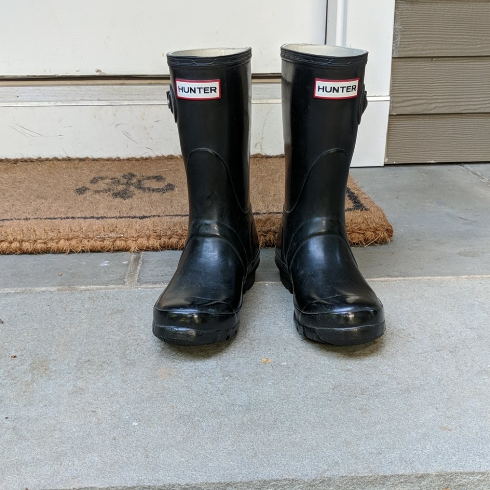 Black, mid-calf Hunter rain boots